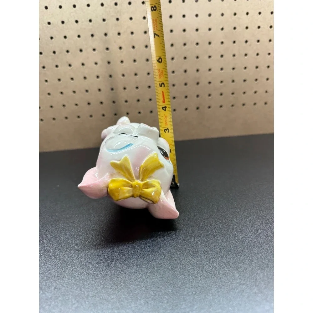 Vintage Japanese Ceramic Piggy Bank with Winking Expression And a Yellow Bow - Picture 11 of 11